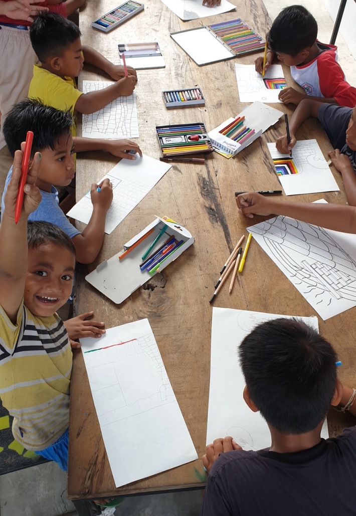 Balinese children enjoying research drawing workshop conducted by German art therapy student Nele Gruender at Kulidan Kitchen 11 August 2019- Image Richard Horstman